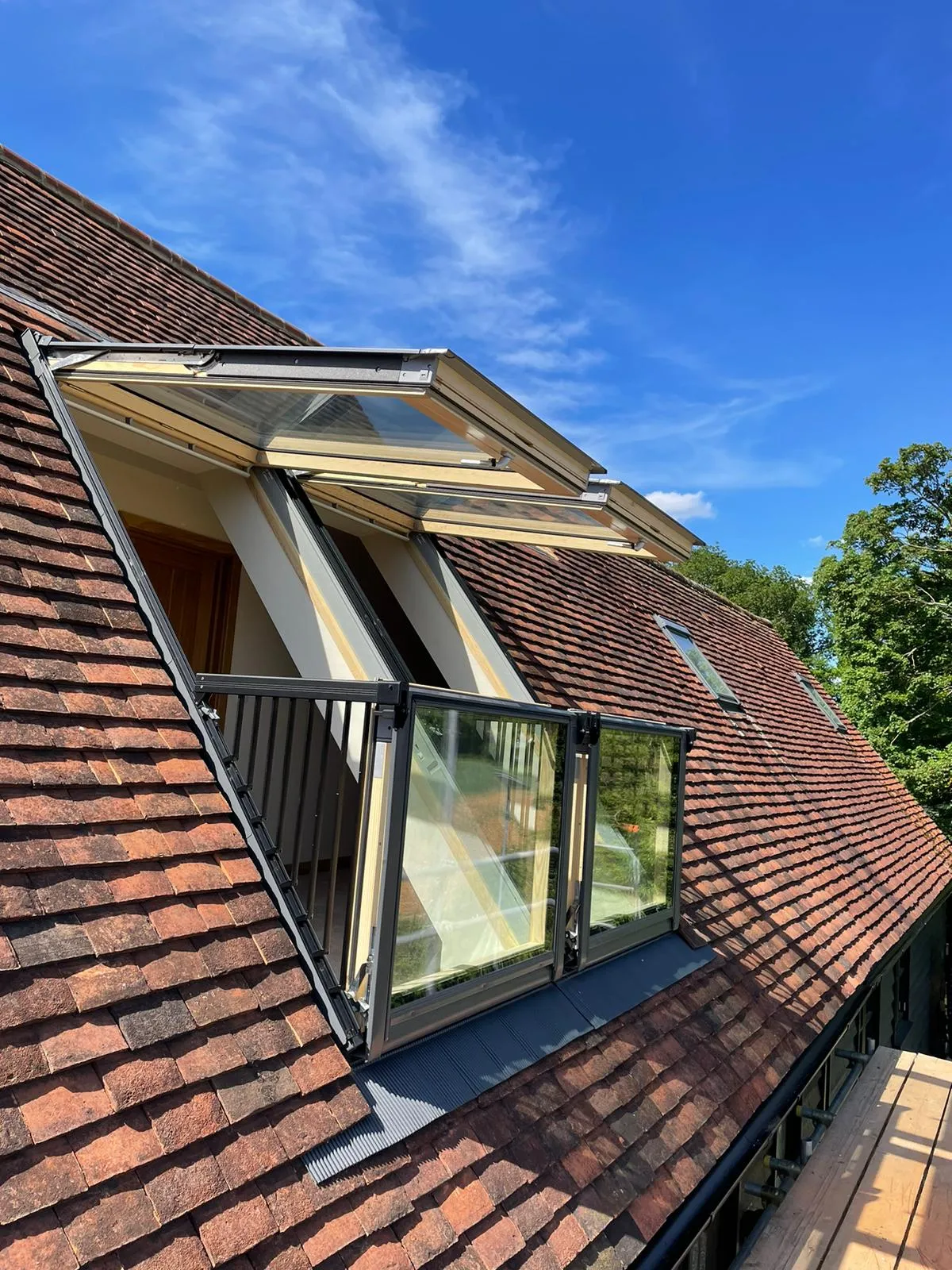 a roof with a glass window on top of it