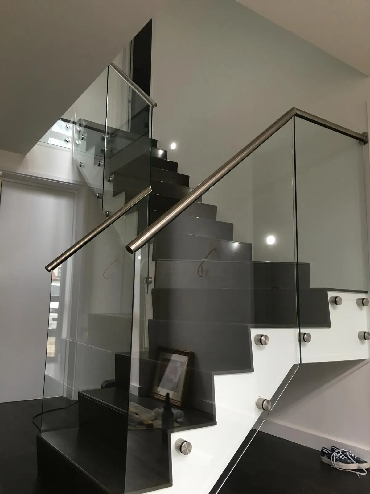 staircase with glass partition
